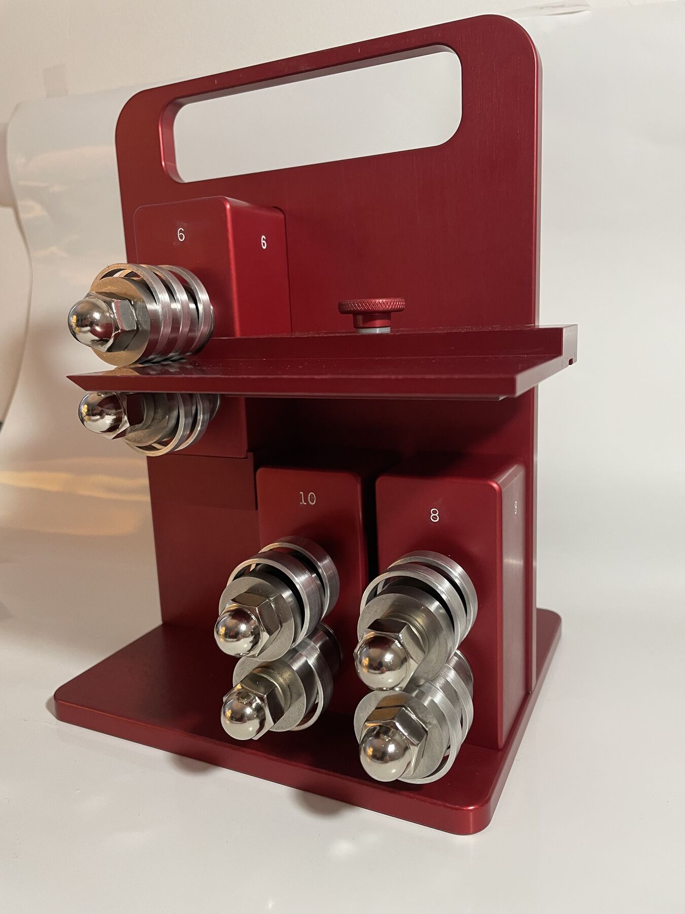 Red Honeydoo cutter with a #6 cartridge mounted and #10 and #8 cartridges held in its storage section Red Honeydoo cutter with a #6 cartridge mounted and #10 and #8 cartridges held in its storage section